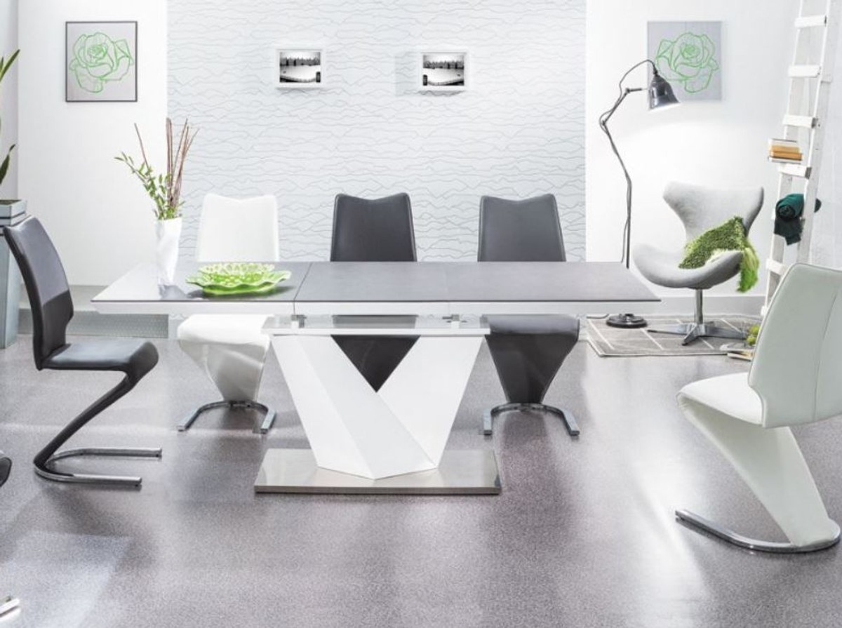 Casa Padrino Designer Esstisch Schwarz / Weiß / Silber - Verschiedene Tischgrößen - Moderner Ausziehbarer Küchentisch mit Tischplatte in Steinoptik - Esszimmer Möbel