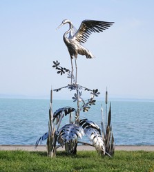 Casa Padrino luxury stainless steel garden sculpture heron on branch silver 103 x 108 x H. 218 cm - Handmade garden decoration figure - Luxury garden decoration