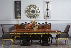 Casa Padrino conjunto de comedor barroco de lujo marrón / negro / oro - 1 Mesa de Comedor Barroco y 8 Sillas de Comedor Barrocos - Muebles de comedor de lujo en estilo barroco - Muebles barrocos
