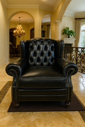 Casa Padrino fauteuil à oreilles Chesterfield de luxe noir / marron foncé - Fauteuil de salon Chesterfield en cuir véritable - Meubles de salon Chesterfield en cuir - Meubles de luxe Casa Padrino fauteuil à oreilles Chesterfield de luxe noir / marron foncé - Fauteuil de salon Chesterfield en cuir véritable - Meubles de salon Chesterfield en cuir - Meubles de luxe