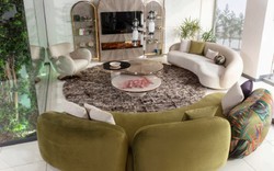 Sofá curvo de salón de lujo verde multicolor cobre