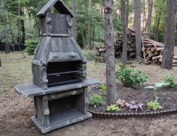 Luxury concrete garden grill in wood look brown