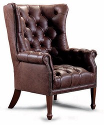 Poltrona a orecchioni Chesterfield di lusso in vera pelle marrone