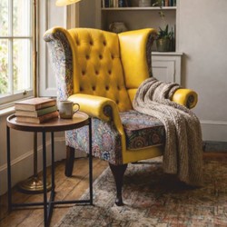 Casa Padrino luxury Chesterfield wing armchair yellow / multicolored / dark brown H. 110 cm