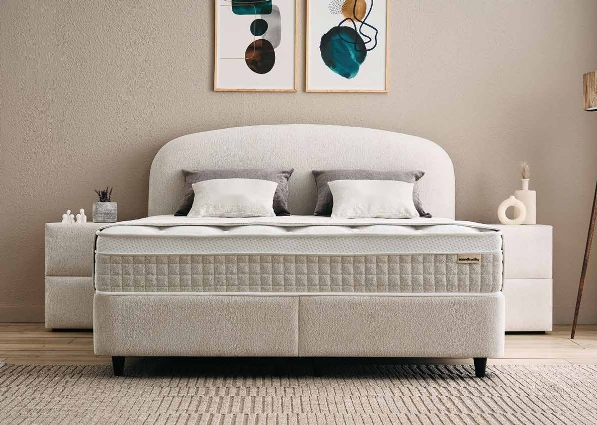 Casa Padrino Luxus Boxspringbett mit geschwungenem Kopfteil Creme 90 x 200 cm - Luxus Schlafzimmer Möbel