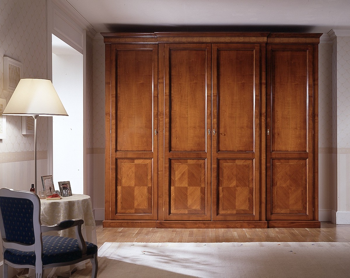 Casa Padrino Luxus Kleiderschrank Braun 305 x 67 x H. 265 cm - Handgefertigtes Massivholz Möbel mit 4 Türen und 2 Schubladen - Luxus Qualität Casa Padrino Luxus Kleiderschrank Braun 305 x 67 x H. 265 cm - Handgefertigtes Massivholz Möbel mit 4 Türen und 2 Schubladen - Luxus Qualität