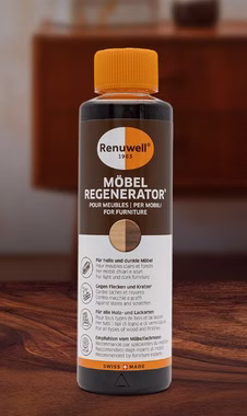 Renuwell Möbel-Regenerator 270 ml Renuwell Möbel Regenerator 270 ml in einer Flasche mit braun-weißem Etikett und orangefarbenem Verschluss auf einer Holzoberfläche.