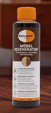 Renuwell Möbel-Regenerator 500 ml Renuwell Möbel Regenerator 500 ml in einer Flasche mit braun-weißem Etikett und orangefarbenem Verschluss auf einer Holzoberfläche.