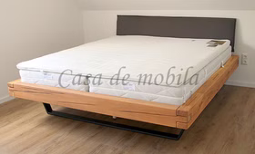 Bett mit Metallkufen 140x200cm Wildeiche massiv geölt Polsterkopfteil Holzbett mit metallbeine schwarz 140x200cm Wildeiche massiv natur geölt mit Polsterkopfteil casademobila Goslar