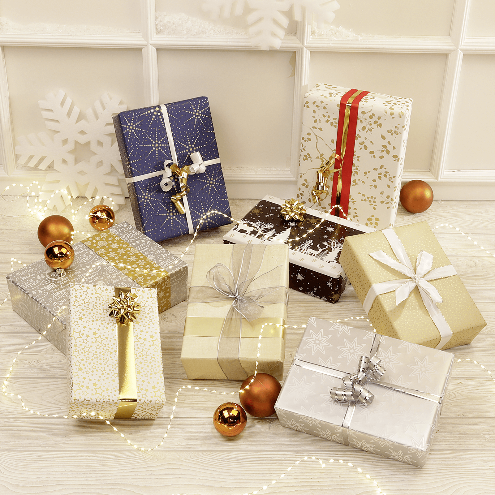 Papier cadeau double face or & argent avec symboles de Noël - 50 m de papier cadeau en rouleau - 7