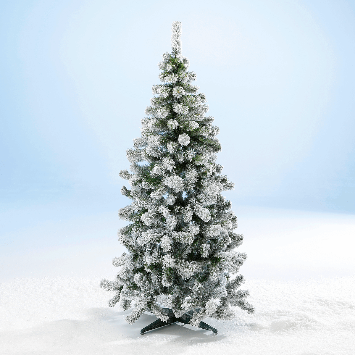 Narrow snow-covered artificial firs in different heights - 0