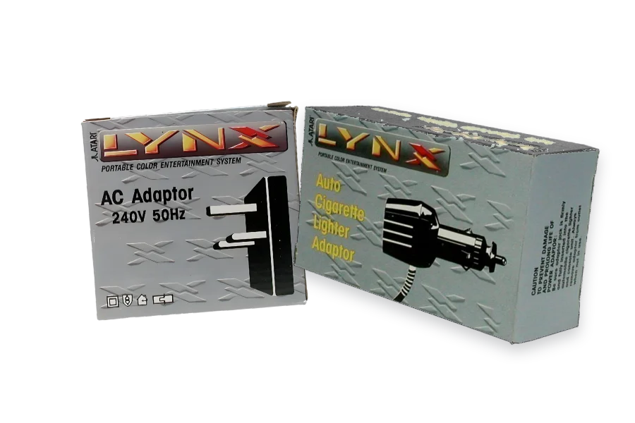 Original-Netzteil und Auto-Adapter für den Atari Lynx in der Originalverpackung